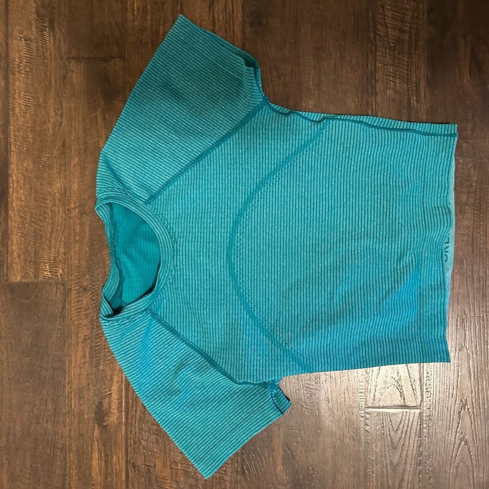 Teal lululemon cropped swiftly tech